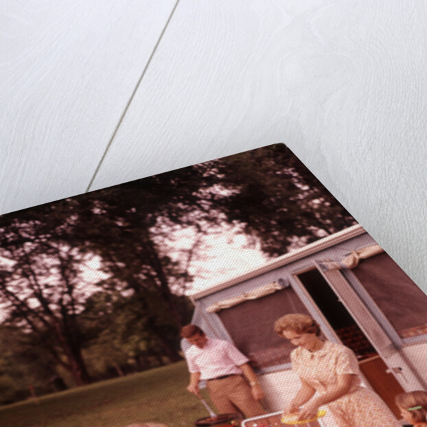 1960s Family Rv Camping Father Grilling Mother And Girls Setting Table by Anonymous