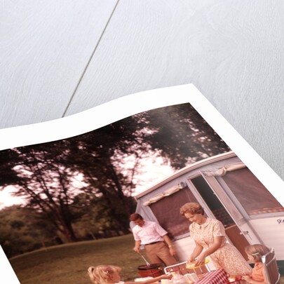 1960s Family Rv Camping Father Grilling Mother And Girls Setting Table by Anonymous
