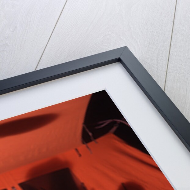 1960s 1970s Grandfather Telling Scary Story To Boys By Tent At Night Campsite In Shadows by Anonymous