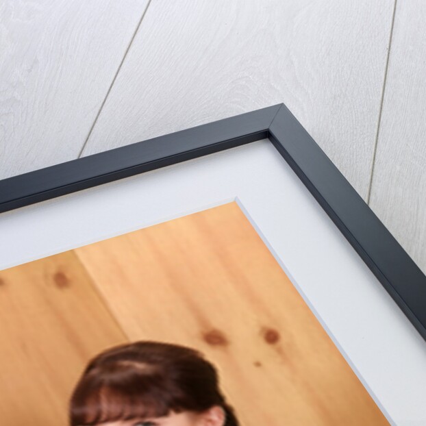 1950s Teenage Girl Talking On Telephone And Holding LP Record by Anonymous