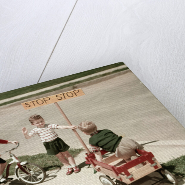 1950s Boys And Girls Outdoor With Tricycle And Wagon Playing Traffic With Police Stop Sign Americana by Anonymous