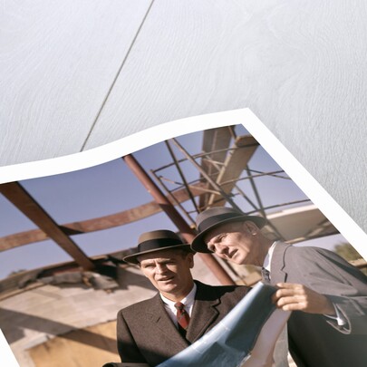 1960s Two Men With Blueprints At Construction Site by Anonymous