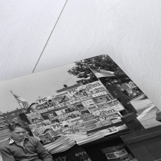 1940s Boy Sitting At Corner Newsstand Writing In Notepad by Anonymous
