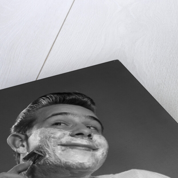 1950s Young Man Shaving With Safety Razor by Anonymous