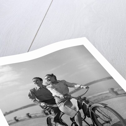 1950s Happy Couple Man Woman Riding Tandem Bike Bicycle Built For 2 by Anonymous