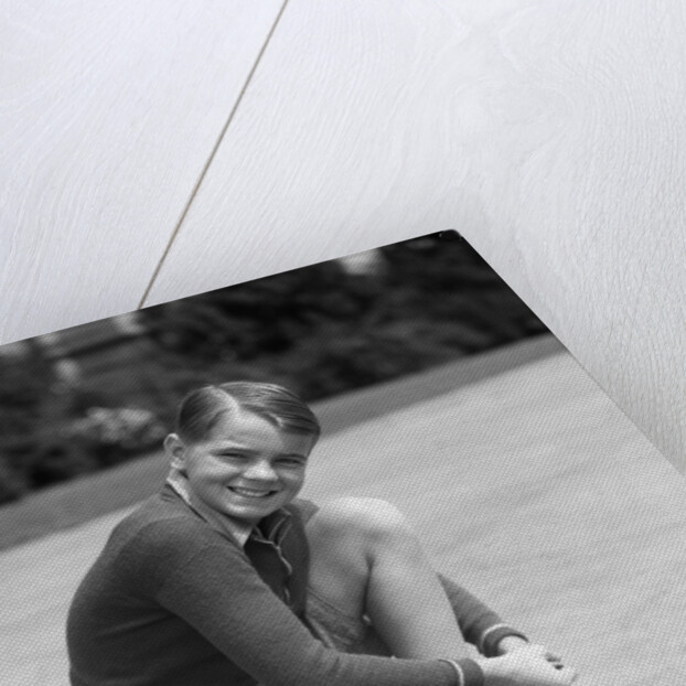 1930s Boy Fastening Metal Roller Skates by Anonymous