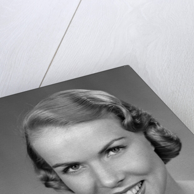 1950s Woman Holding Tooth Brush by Anonymous