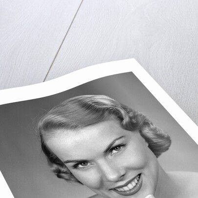 1950s Woman Holding Tooth Brush by Anonymous