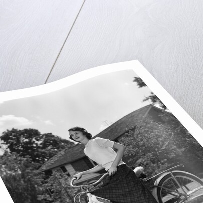1950s Teen Girl Standing With Bike by Anonymous