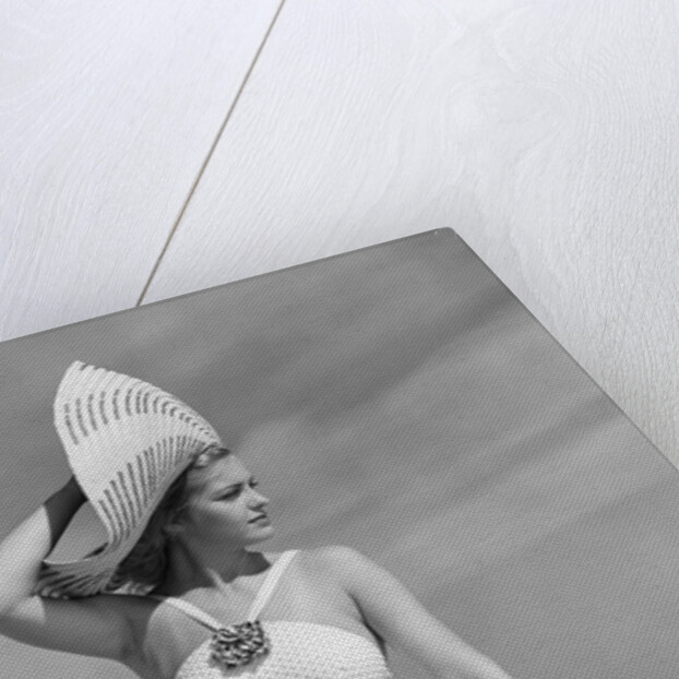 1940s Woman In White Bathing Suit On Beach Wearing Big Straw Hat by Anonymous