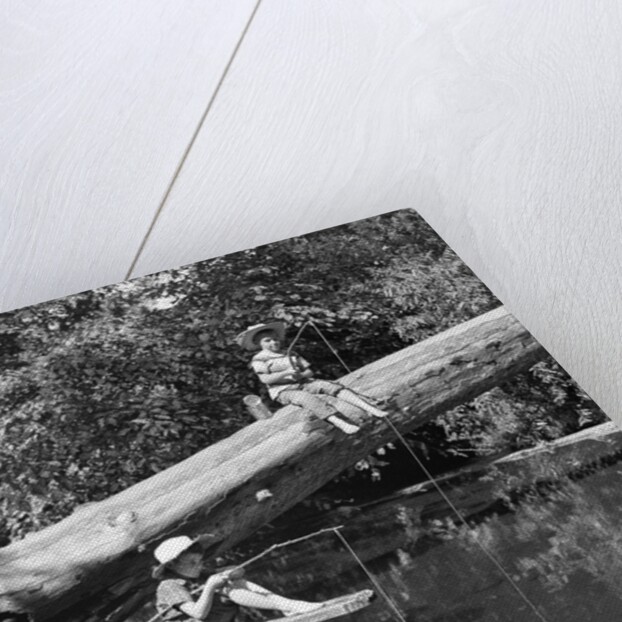 1940s 1950s Pair Of Boys In Straw Hats and Cuffed Jeans Fishing In Stream by Anonymous