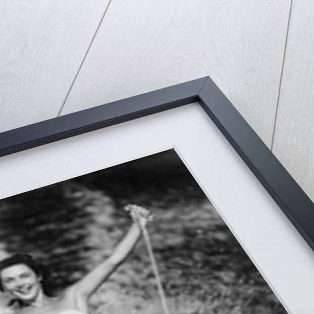 1950s Woman In Two Piece Bathing Suit Aquaplaning Water Skiing by Anonymous