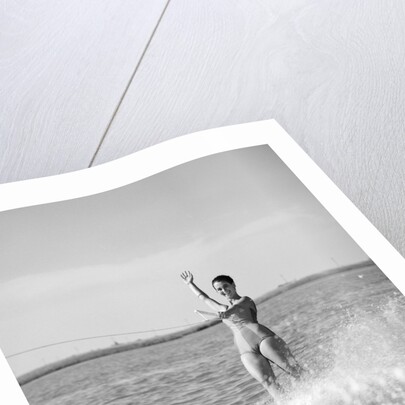 1960s Woman Water Skiing Waving With One Hand by Anonymous
