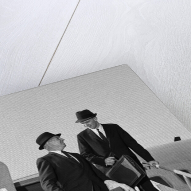 1960s Two Business Men Briefcase Exit Airplane Steps by Anonymous