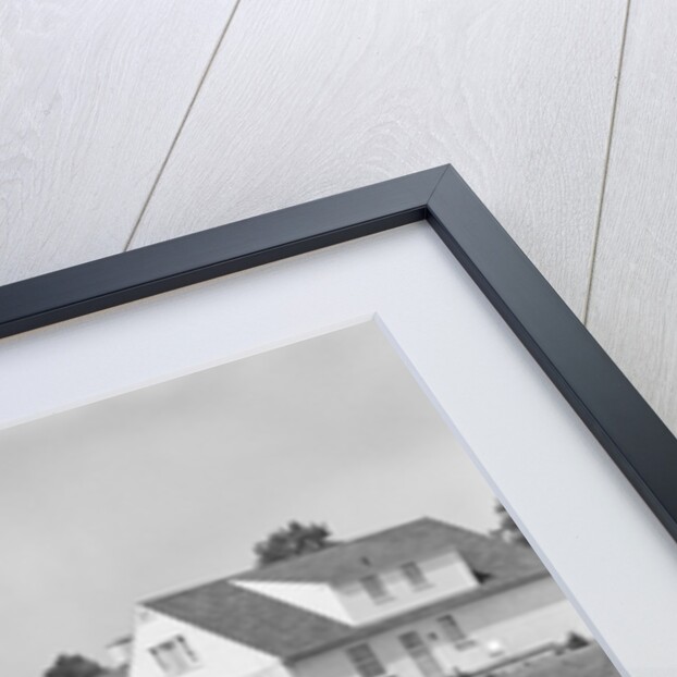 1950s 8 Kids Boys and Girls Ride Bicycles On Country Rural Road Lane Fun House In Background by Anonymous