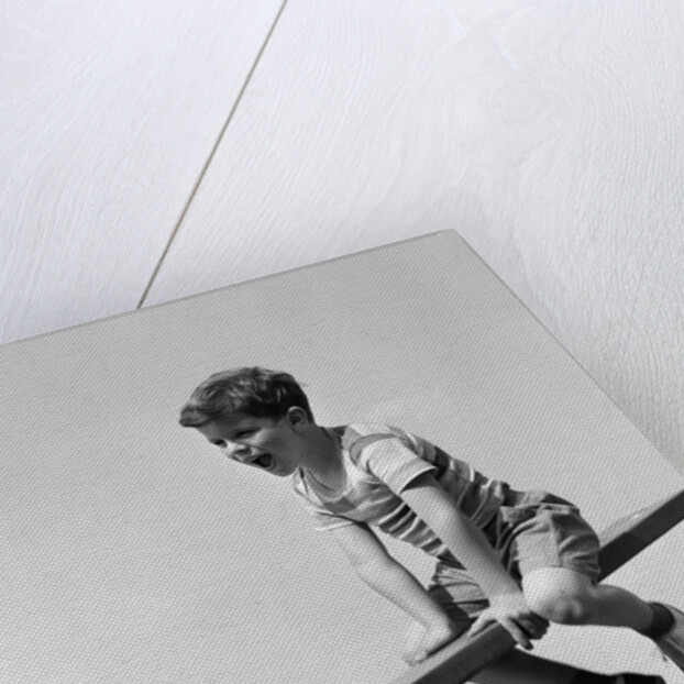 1930s 1940s Excited Boy On Seesaw Playing by Anonymous