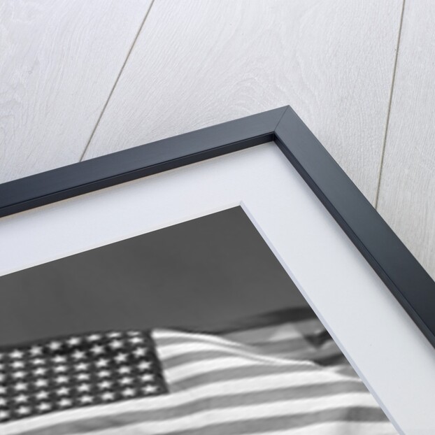 1940s Boy Holding American Flag Saluting Wearing Short Pants by Anonymous