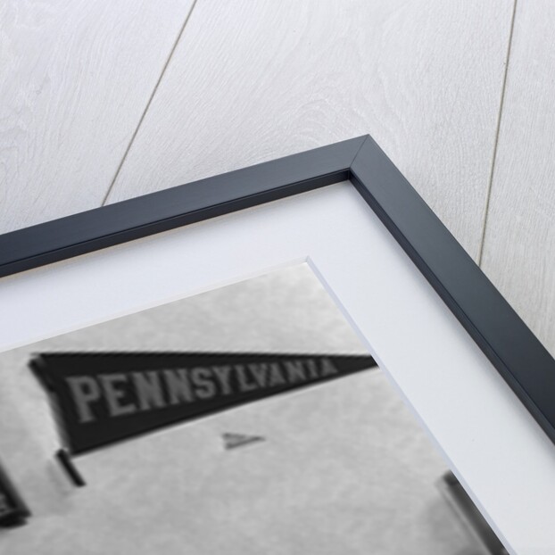 1930s 1940s Two Teen Girls Lying On Dormitory Beds Room Mates Listening To Radio College School Pennants On Wall by Anonymous