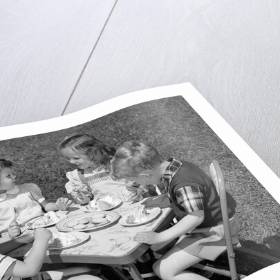 1950s Boys and Girls At Table Eating Cookies and Ice Cream For Birthday Party by Anonymous