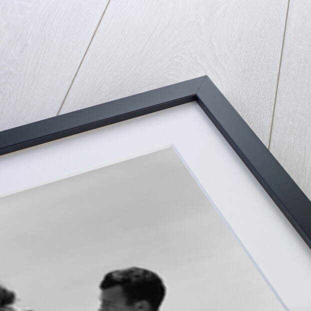 1950s Father Lifting Son And Daughter Onto A Playground Seesaw Outdoor by Anonymous