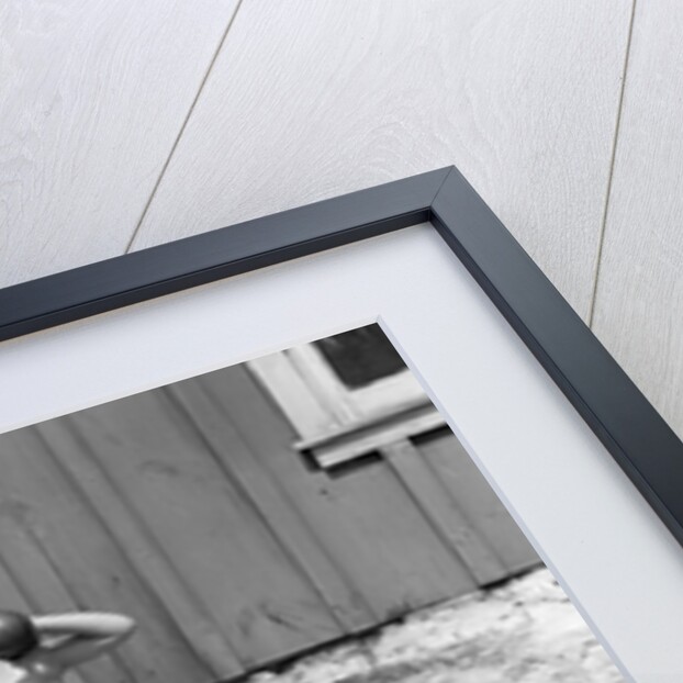 1930s 1940s Boys Playing Carnival Strongman One Lifting Dumbbells Other Announcing Act Through Megaphone by Anonymous