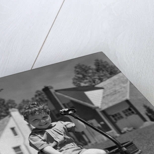1940s Boy Sitting In Wagon by Anonymous