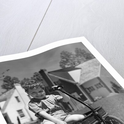 1940s Boy Sitting In Wagon by Anonymous