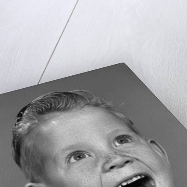 1960s Portrait Excited Boy With Mouth Wide Open Laughing by Anonymous