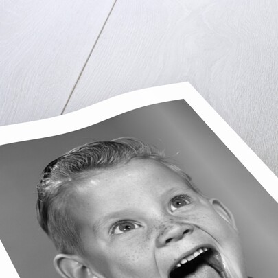 1960s Portrait Excited Boy With Mouth Wide Open Laughing by Anonymous