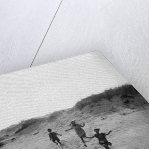 1920s 4 Kids 2 Boys 2 Girls Running Down Sand Dune by Corbis