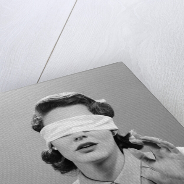 1950s Woman Blindfolded by Anonymous