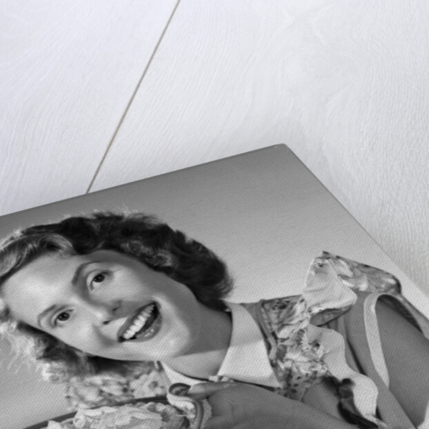 1950s Woman Presenting Holding Freshly Baked Pie by Anonymous