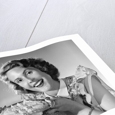 1950s Woman Presenting Holding Freshly Baked Pie by Anonymous