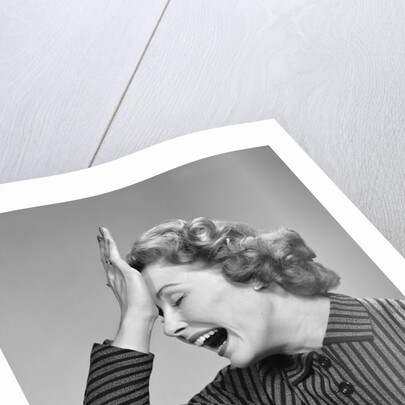 1950s Woman Hitting Forehead With Heel Of Hand by Anonymous