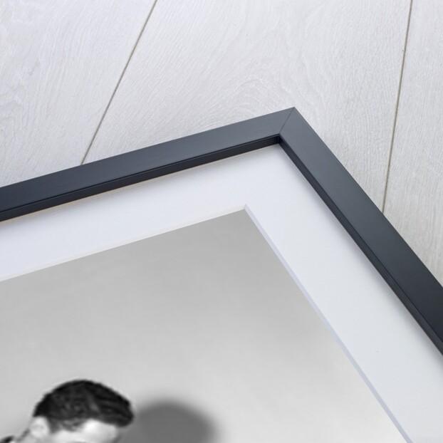 1940s Teen Couple Boy With Hand Over Girl Eyes Surprising Her With Box Of Valentines Day Candy by Anonymous