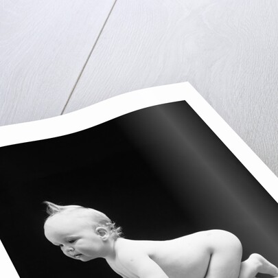 1930s 1940s Naked Baby Crawling On Wooden Box by Anonymous