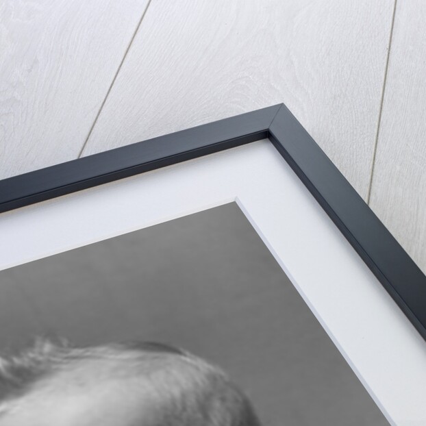 1940s Baby In Diaper Looking Back Over Shoulder With Funny Facial Expression by Anonymous