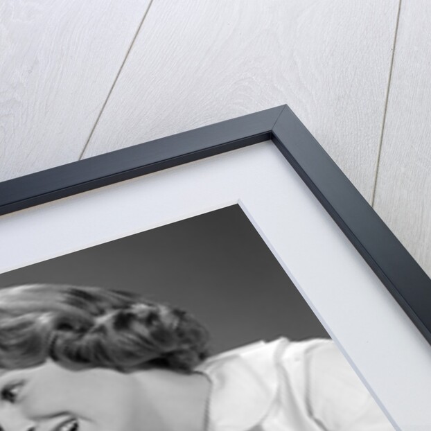 1960s Mother And Unhappy Baby Playing With Blocks by Anonymous