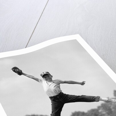 1960s Boy Jumping In Outfield To Catch Baseball With Gove by Anonymous