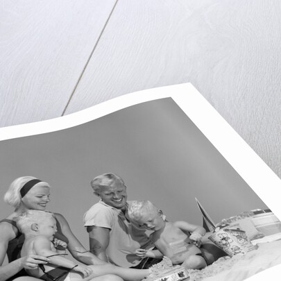 1970s 1960s Family Father Mother Twin Sons Playing In Sand On Beach Outdoor by Anonymous