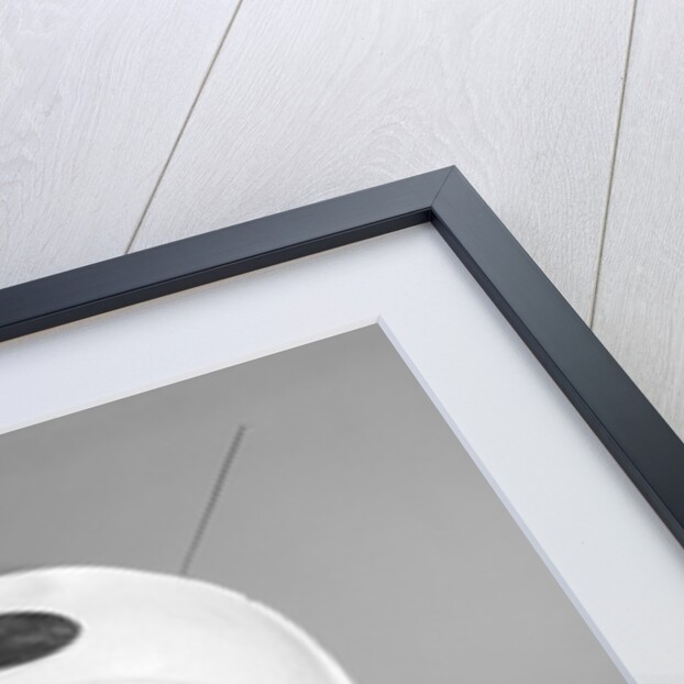 1960s Baby In Diaper Seated Holding Astronaut Helmet With Antennae On Head by Anonymous