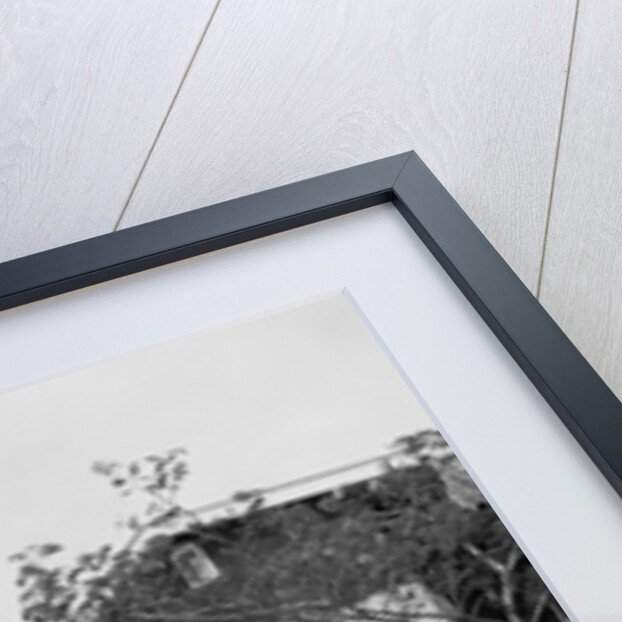 1960s Man Pushing Stroller Baby Carriage Suburban Sidewalk by Anonymous