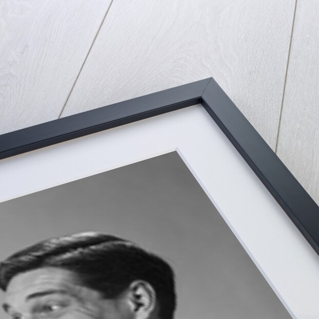 1960s Profile Magician Man Pulling 4 Eggs Out Of Hat Holding Them Between Fingers by Anonymous