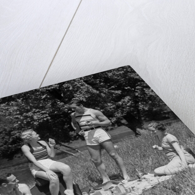 1930s Two Couples Having Summer Picnic With Food And Drink Spread Out On Blanket The Tip Of A Canoe Is Visible by Anonymous