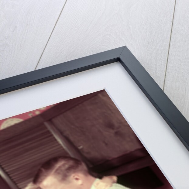 1950s Family In Kitchen Mother Pouring Milk From Pitcher For Dad And Kids by Anonymous