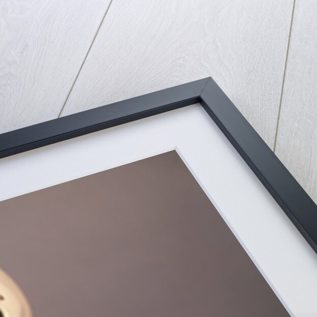 1950s 1960s Boy Drinking Milk Wearing Football Helmet Red Jersey Holding Ball by Anonymous