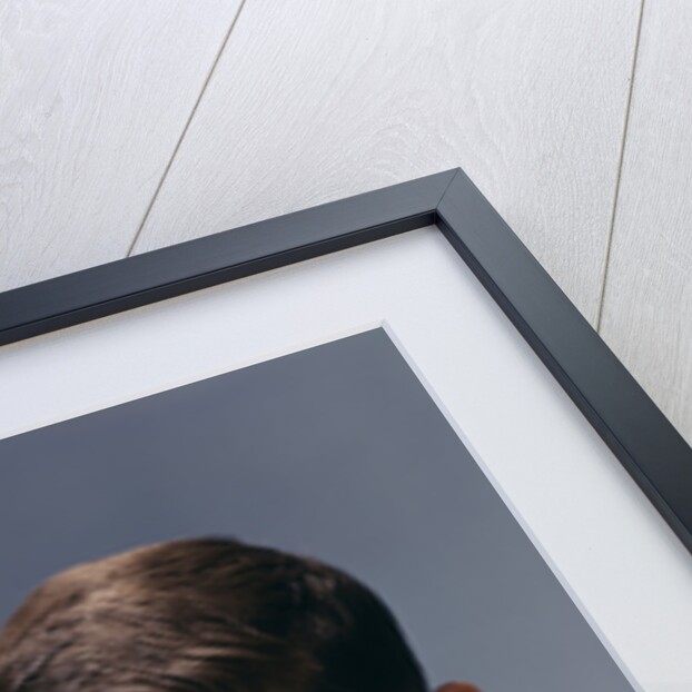 1950s 1960s Boy Pouring Syrup On Breakfast Pancakes by Anonymous