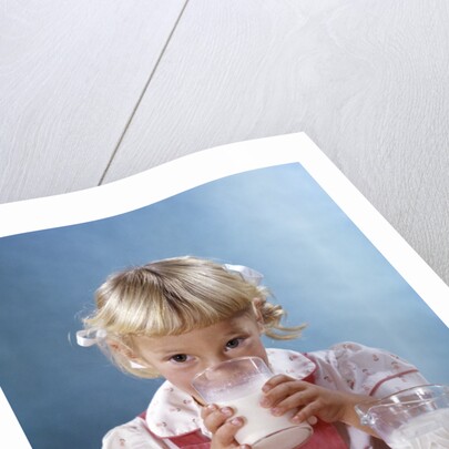 1950s 1960s Girl Drinking Milk Plate Cookies by Anonymous