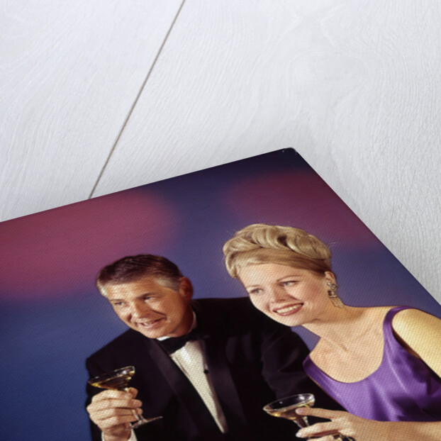 1960s 1970s Couple In Formal Tuxedo And Evening Dress Toasting With Champagne Glasses by Anonymous