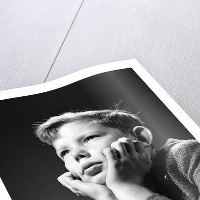 1940s Bored Serious Boy Waiting Chin Resting In Hands by Anonymous